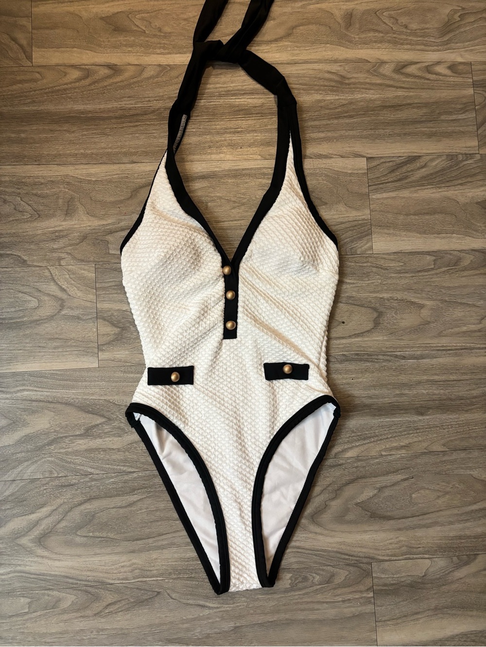 Cream One-Piece Swimsuit with Black Trim and Gold Buttons